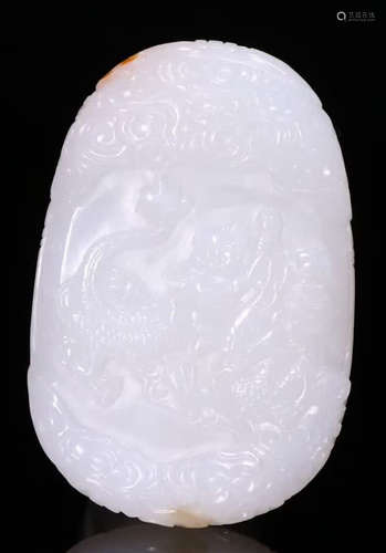 A HETIAN JADE TABLET CARVED WITH BEAST