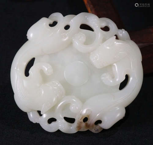 A HETIAN JADE BI CARVED WITH BEAST