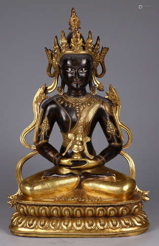 A GILT BRONZE LONGEVITY BUDDHA STATUE