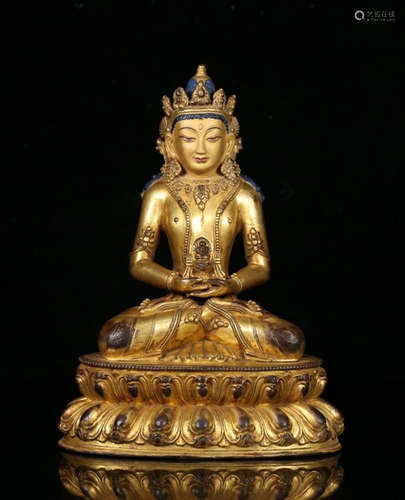 A TIBETAN GILT BRONZE CARVED BUDDHA