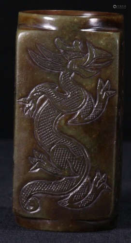 AN ANTIQUE JADE PENDANT CARVED WITH BEAST