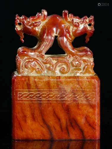 AN ANTIQUE JADE SEAL CARVED WITH BEAST