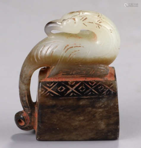 A HETIAN WHITE JADE SEAL CARVED WITH BIRD