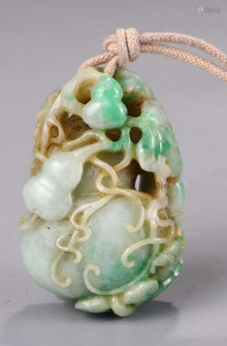 A JADEITE PENDANT CARVED WITH GOURD