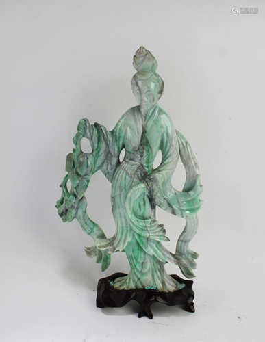 A Carved Jade Figurine