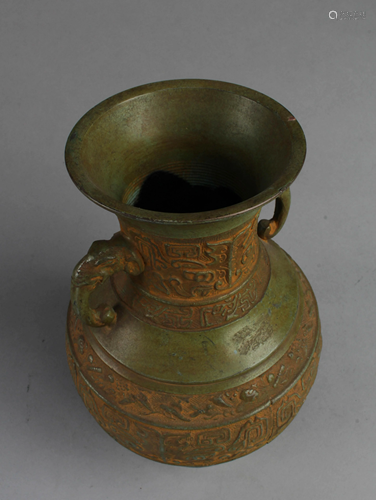 A Bronze Vase with Twin Handles