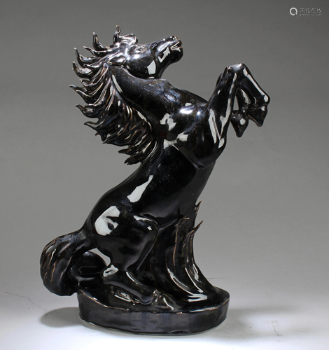 A Porcelain Horse Statue