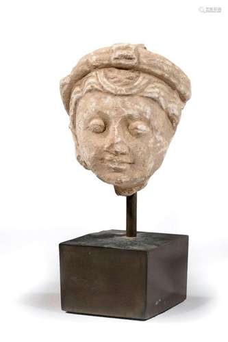 Stuccoed woman's head. \nGandhara I 5th century A.D…