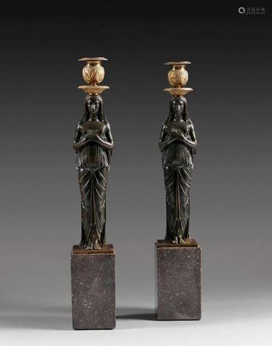 LARGE PAIR OF TORCHES \nIn ormolu and patinated bro…