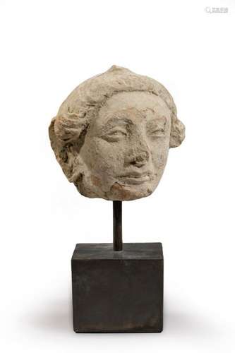 Stuccoed woman's head. \nGandhara I 5th century A.D…