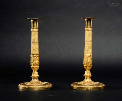 Pair of torches in gilt bronze decorated with lyre…