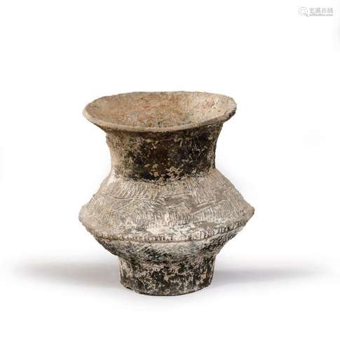 Grey terracotta vase with incised decoration. \nBan…