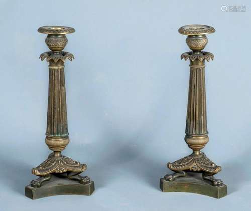 PAIR OF TORCHES \nin chiselled gilt bronze with pat…