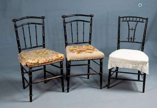 PAIR OF CHAIRS \nin blackened and gilded wood, seat…