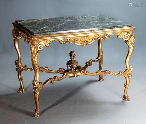 MIDDLE TABLE \nIn carved and gilded wood console ba…