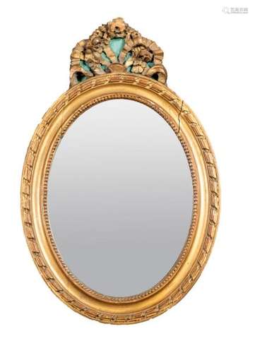 Mirror \nIn a gilded wood and stucco frame surmount…