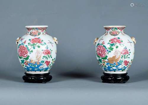 Two ball shaped porcelain vases with decoration \nf…