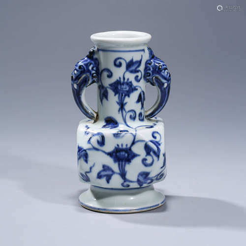 A  BLUE AND WHITE FLORAL PORCELAIN VASE WITH DOUBLE EARS