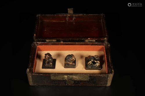 A Set of Bronze Lion Handle Seals, 3 Pieces