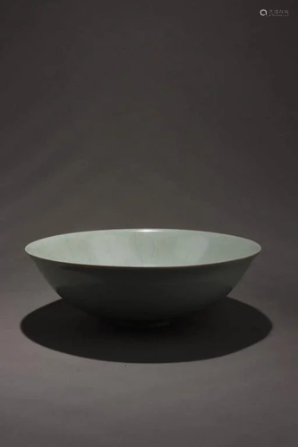 A Porcelain Bowl With A Flaring Mouth