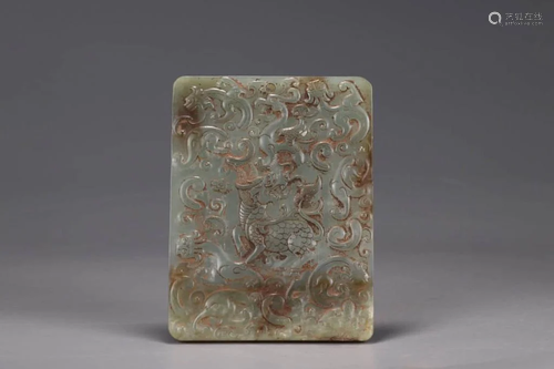 A Kylin Carved Hetian Jade Pendant