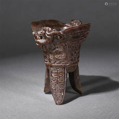 A Chi Dragon Carved Three- legged Jue Cup