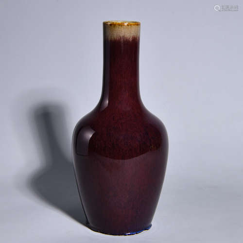 A RED GLAZE BOTTLE