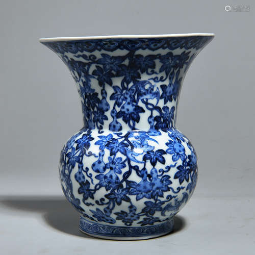 A BLUE AND WHITE WALL BOTTLE WITH GOURD PATTERNS