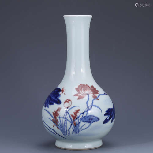 A BLUE-AND-WHITE OVERGLAZED RED FLASK WITH FLOWER PATTERNS