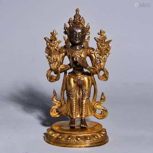 A COPPER-GILDED  BUDDHA STATUE