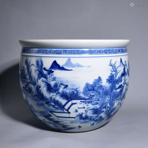 A BLUE AND WHITE JAR WITH LANDSCAPE PATTERNS