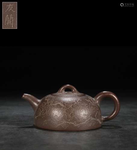 A Zisha Teapot With Plum Pattern And Mark