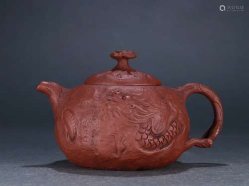 A Zisha Teapot With Dragon Carved And Mark
