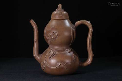 A Zisha Teapot With Gourd Shaped