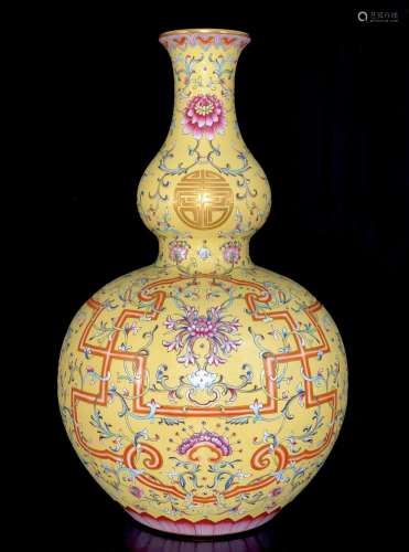 A Porcelain Enameled Gilt Gourd Vase