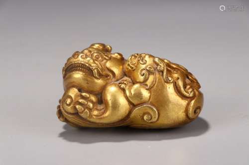 A Gilt Bronze Beast Carved Ornament