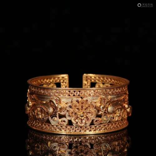 A Gilt Silver Auspicious Pattern Bangle