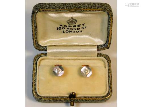 A pair of 18ct gold & platinum collar studs set wi