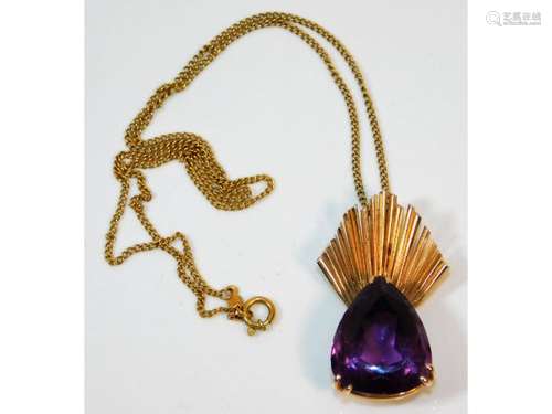 An 18ct gold mounted amethyst with 18ct gold 16.5i