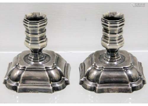 A pair of small white metal Danish taper holders 2