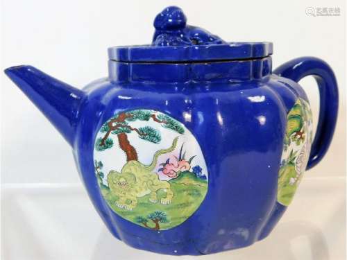 A hand painted Yixing teapot with enamelled panels