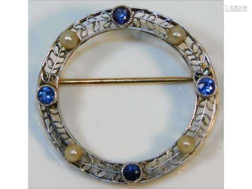 A c.1900 brooch with 18ct (electronically tested)