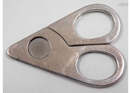 A pair of 0.830 silver cigar cutters, probably Dan