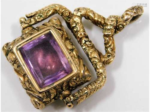 A 19thC. yellow metal watch fob set with amethyst