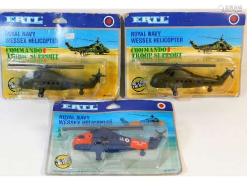 Three cased Ertl helicopters, two military & one r