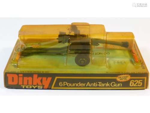 A boxed Dinky model six pounder anti-tank gun no.6