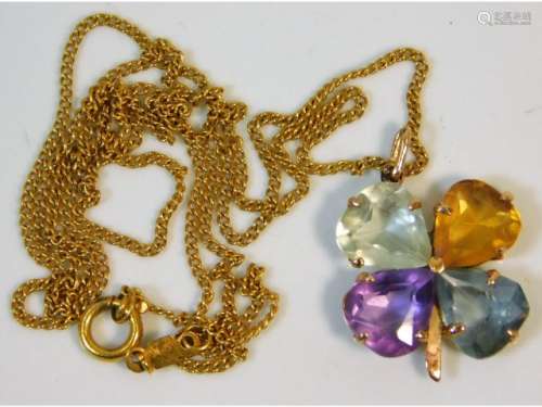 An 18ct gold chain & pendant set with shamrock des