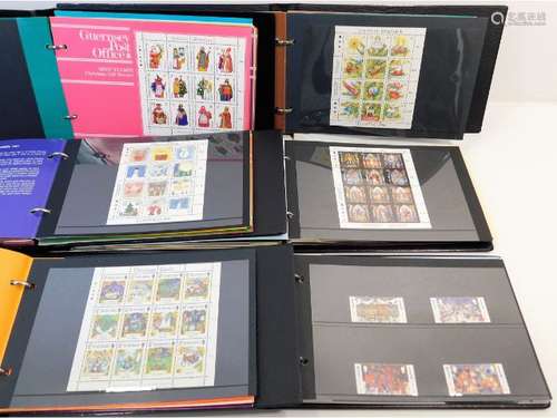 Three mint stamp albums relating to Guernsey, appr