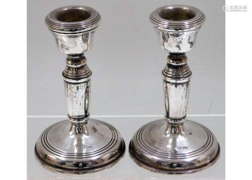 A pair of small 1975 Birmingham silver candle hold