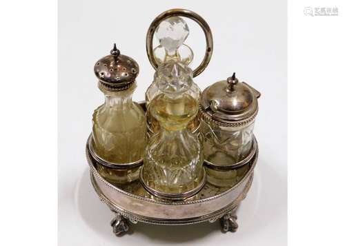 A 19thC. silver plated cruet with claw feet 6in ta